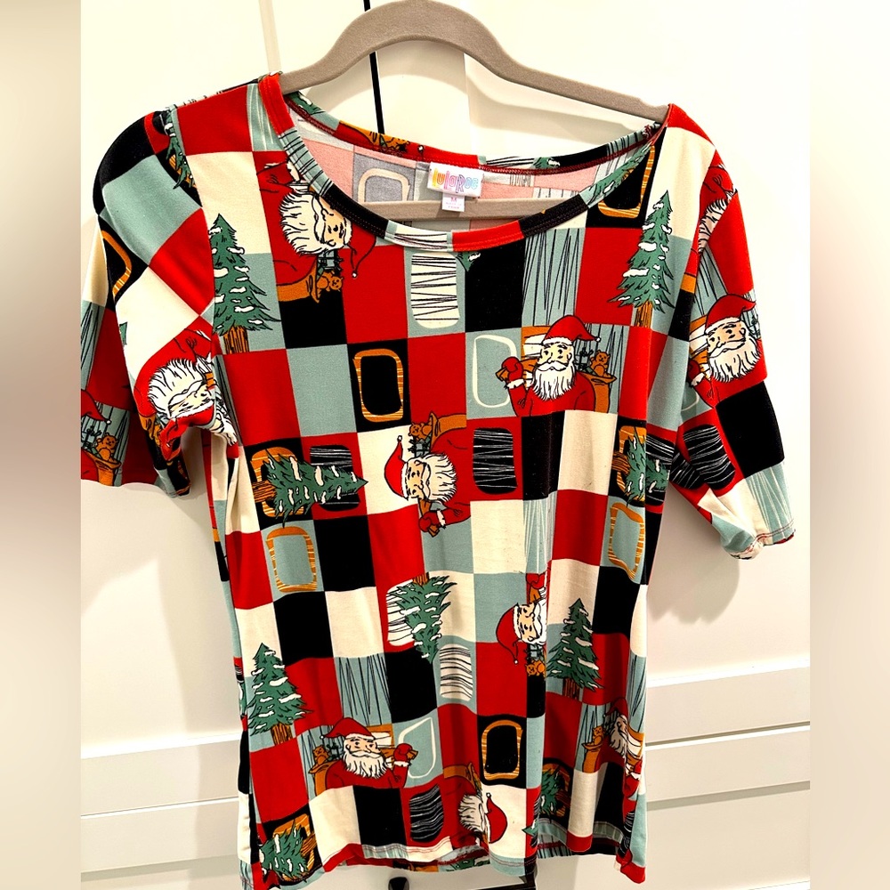 Lularoe Christmas shirt. Never worn or washed.